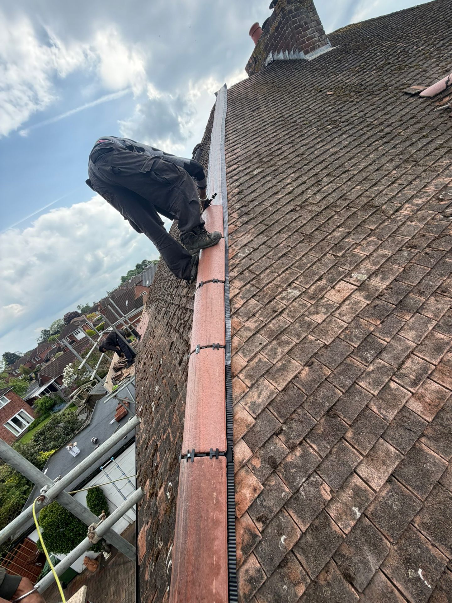 Dry-fix ridge tile repair on a clay tile roof, Worcester